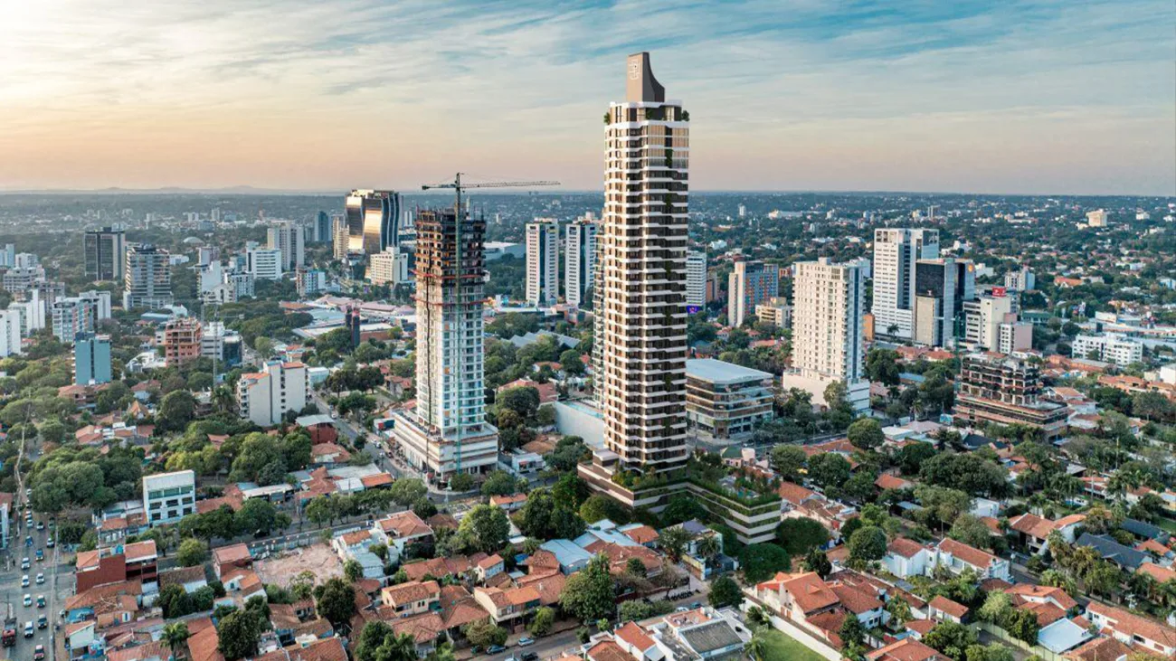 High-rise residential tower under construction on the skyline of Asunción, Paraguay